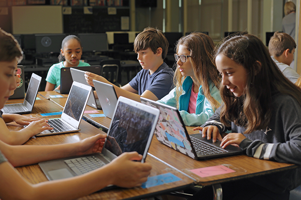 Students in using Chromebooks